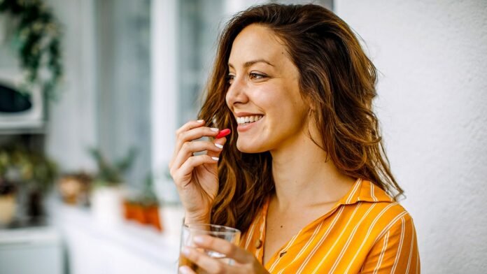 woman-taking-saffron-supplement.jpg