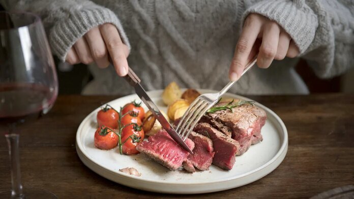 eating-red-meat-with-knife-and-fork.jpg