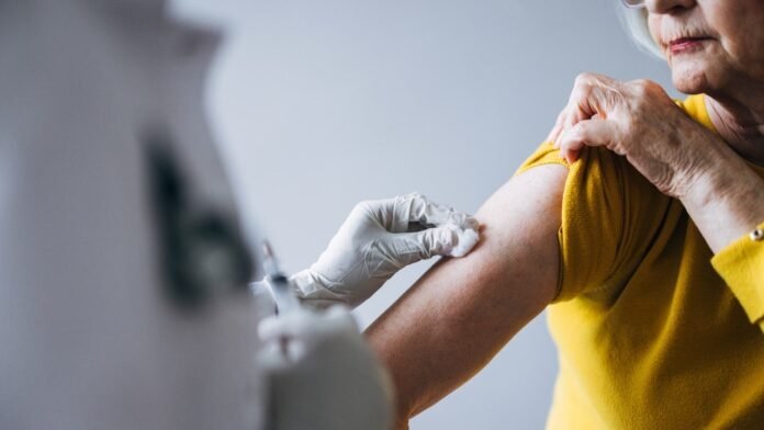 older-woman-getting-vaccine.jpg